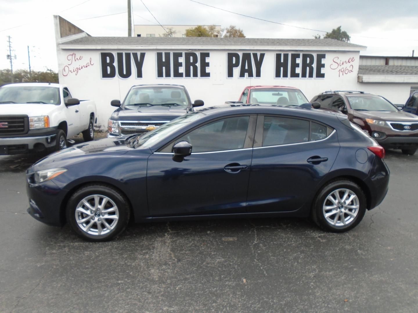 2014 Mazda MAZDA3 (JM1BM1M73E1) , located at 6112 N Florida Avenue, Tampa, FL, 33604, (888) 521-5131, 27.954929, -82.459534 - Photo#0